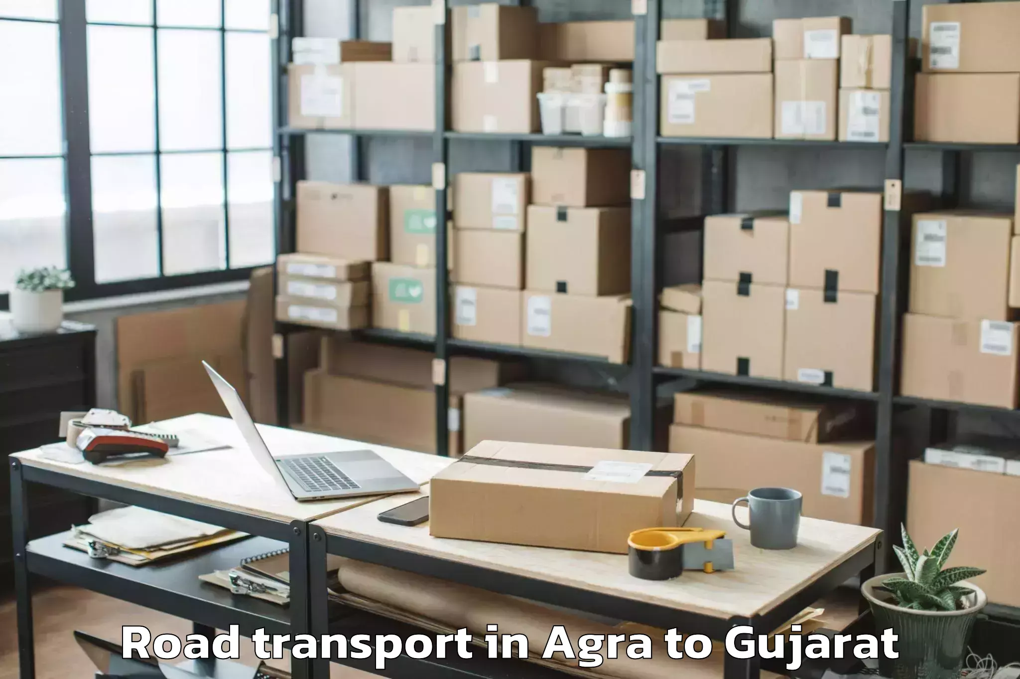 Top Agra to Dhoraji Road Transport Available